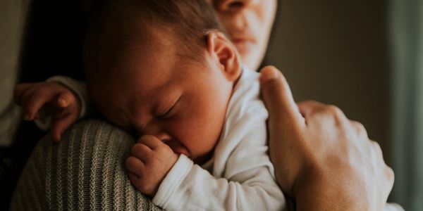 Mum holding baby
