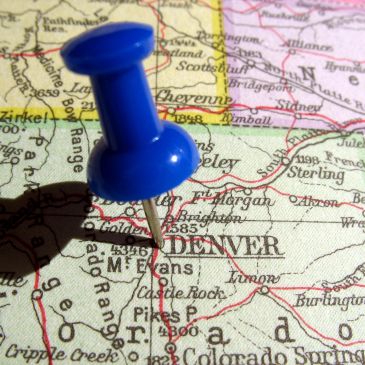 Blue pushpin on Denver map.