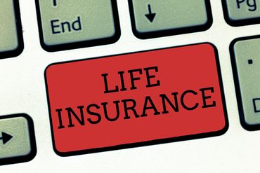 Keyboard key labeled LIFE INSURANCE in red.