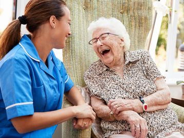 A client sharing a funny story with the caregiver. 