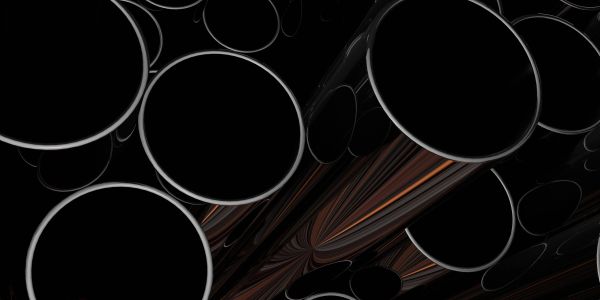Close-up of black glossy pipes.