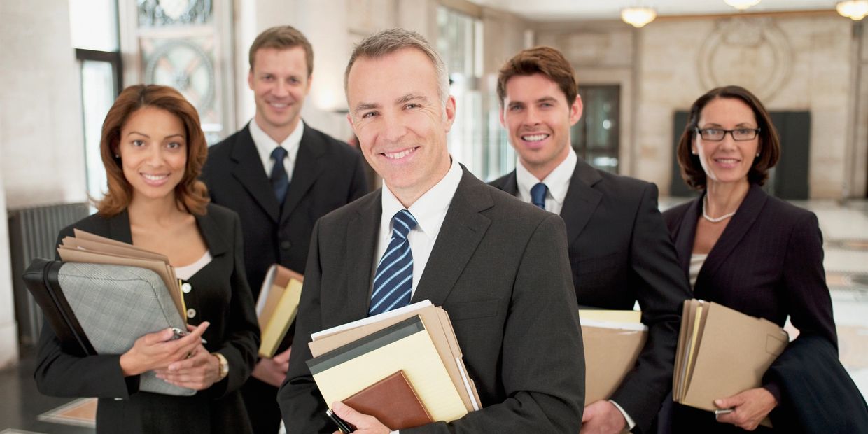 a happy legal team leveraging KIT IT services