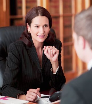 Professional woman in an office meeting.