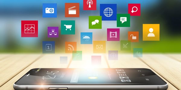 Smartphone with colorful app icons floating above it.