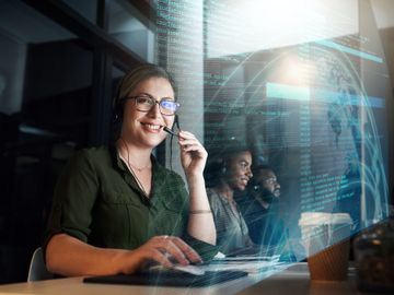 A person is typing on a laptop