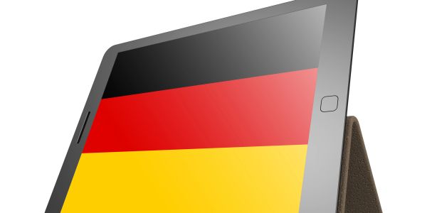 Tablet displaying the German flag on its screen.