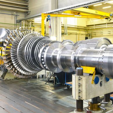 Large industrial turbine in a manufacturing facility.