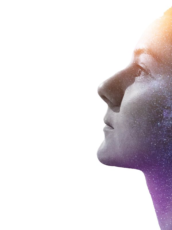 serene person looking upward and a galaxy is their hair