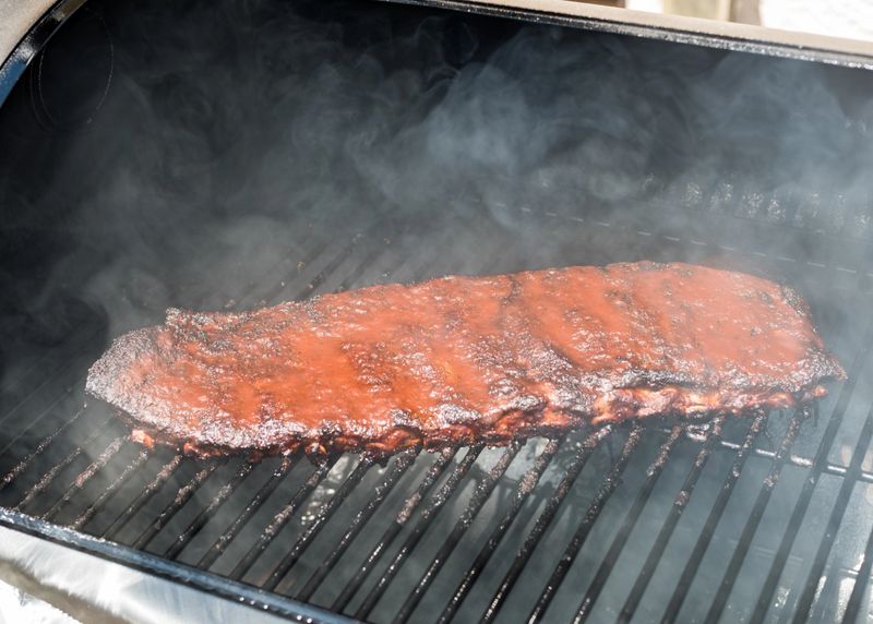 Seasoned Ribs on Smoker Ready to Eat