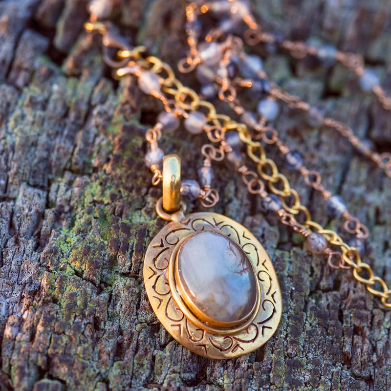 Natural stone bead components necklace on wooden background