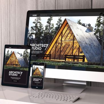 Desktop computer, tablet, and mobile phone displaying the same website