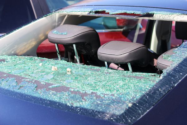 car with a broken back glass