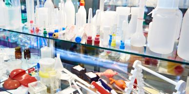 Assortment of plastic containers and bottles on display.