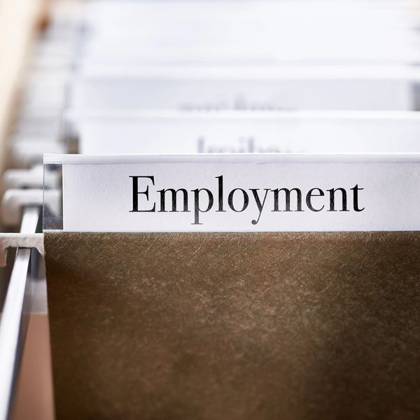 File folder labeled 'Employment' in a filing cabinet.