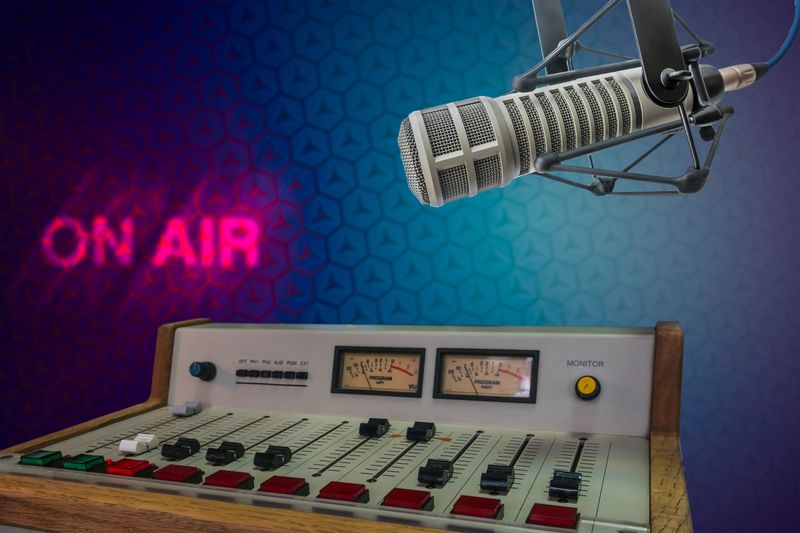 Professional microphone and audio mixer in radio studio