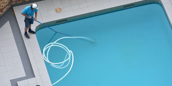 Cleaning and Balancing Swimming Pool Water.  Patriot Pool Works. Murrrells Inlet, SC.