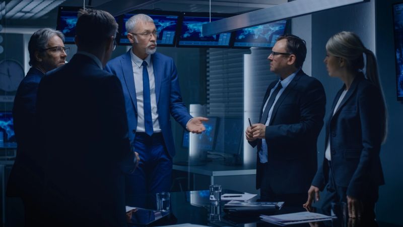 Team of Politicians, Government Officials, Corporate Business Leaders Have Heated Debate while Standing at the Negotiating Table in the Conference Room, Trying to Come to an Agreement.