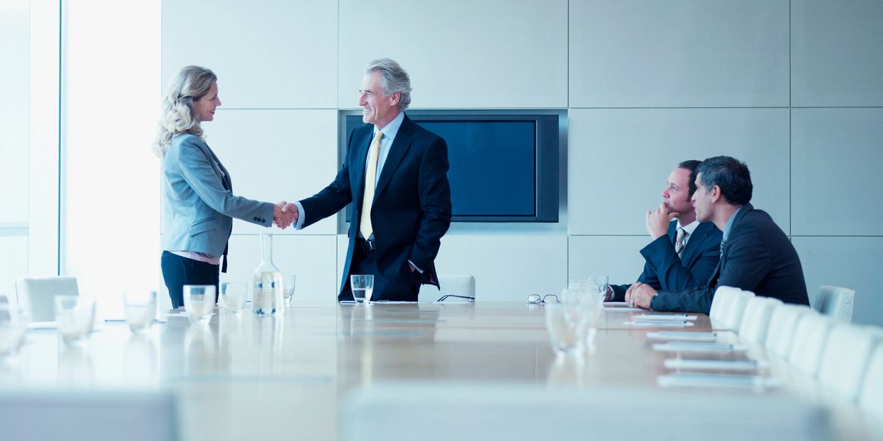 A CEO welcoming a new team member and or consultant