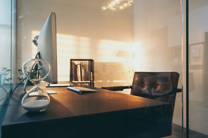 Loft and cozy interior design office with glass wall partition .