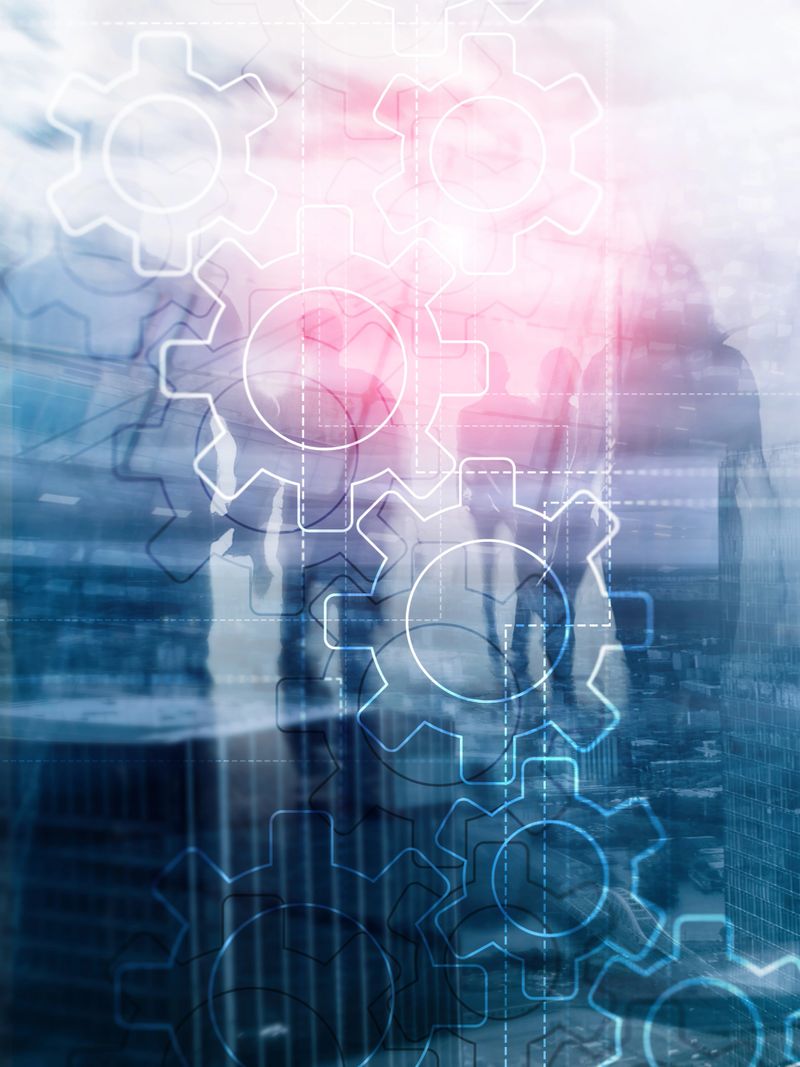 Double exposure gears mechanism on blurred background. Business and industrial process automation concept. Abstract Cover Design Vertical Format.