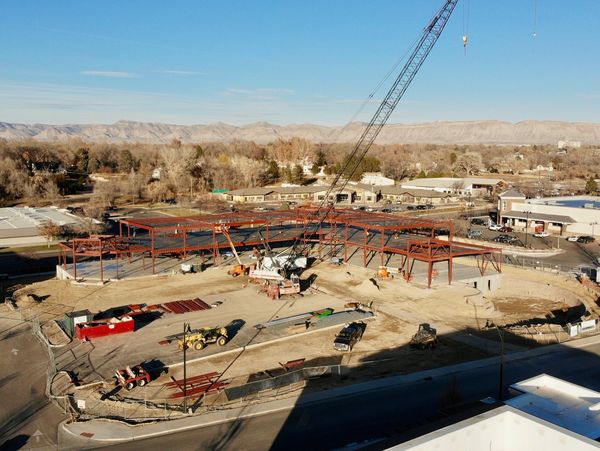 Drone imagery of the progress of a two story commercial building