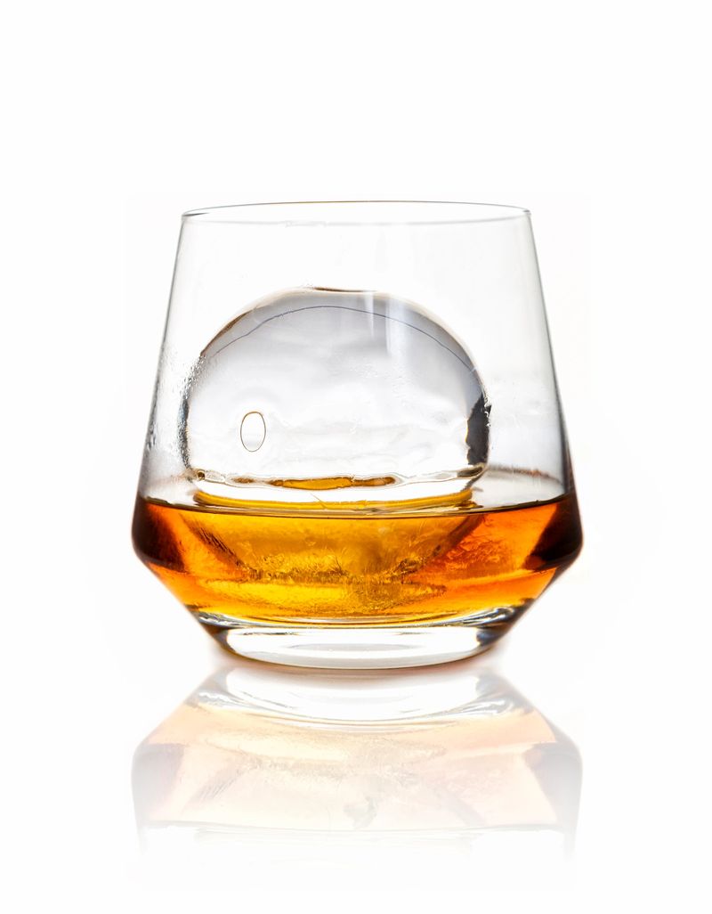 glass of whiskey with ice