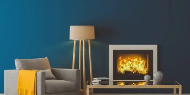 Cozy living room with a burning fireplace and modern decor.