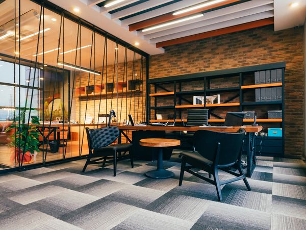 Modern office with geometric patterned floor.