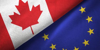 Canadian and European Union flags side by side.