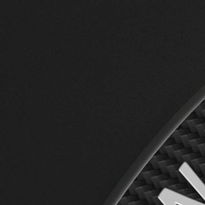 A solid black background with no visible objects or patterns.