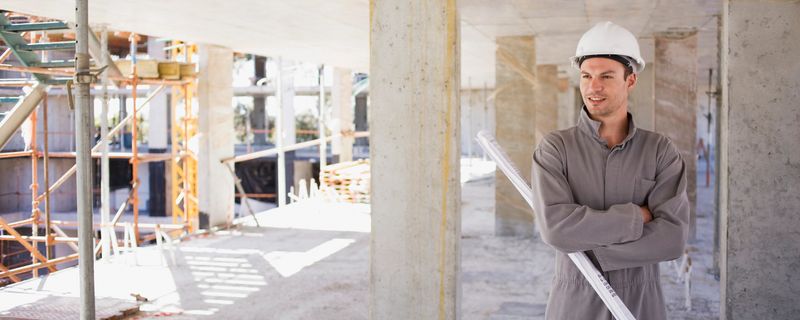 blueprints de retención Trabajador de construcción en sitio de construcción