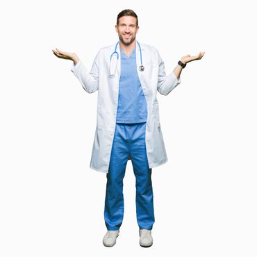 Male doctor in scrubs shrugging with both hands raised.