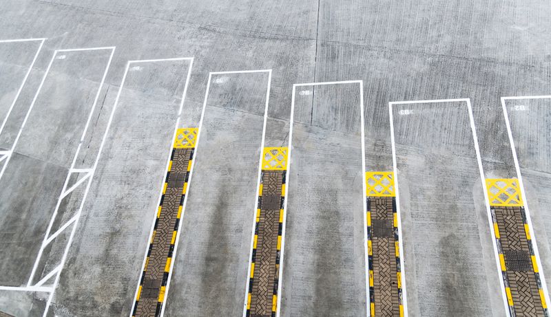 Bus parking sign on floor.