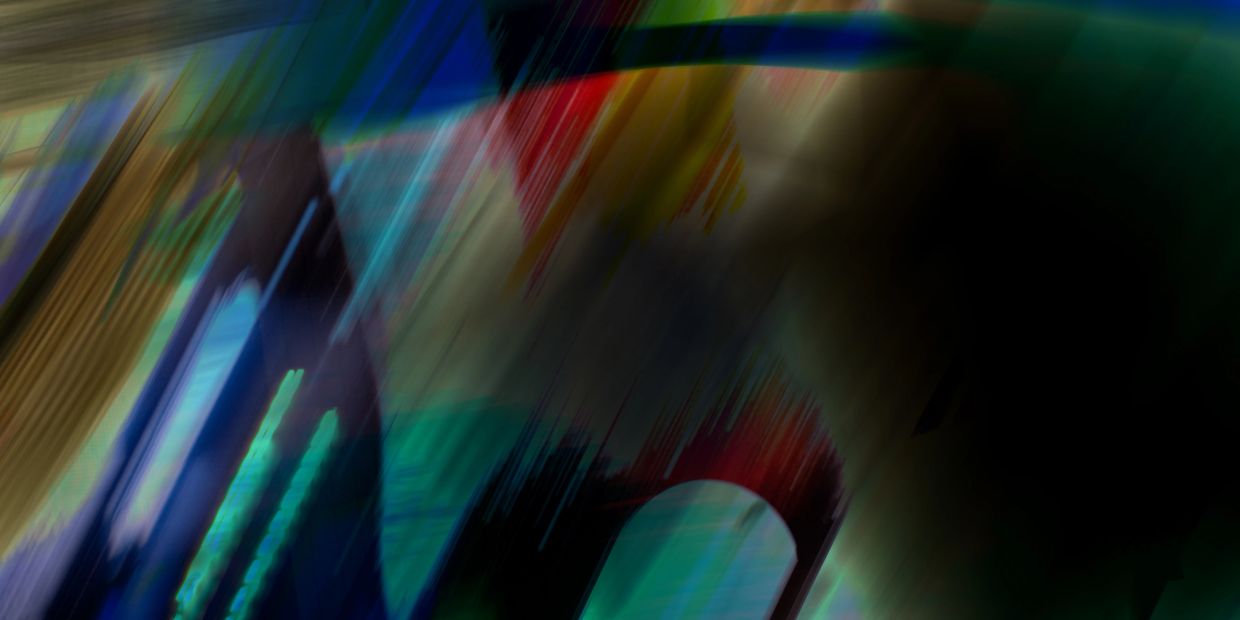 Abstract motion blur with vibrant colors and dynamic streaks.