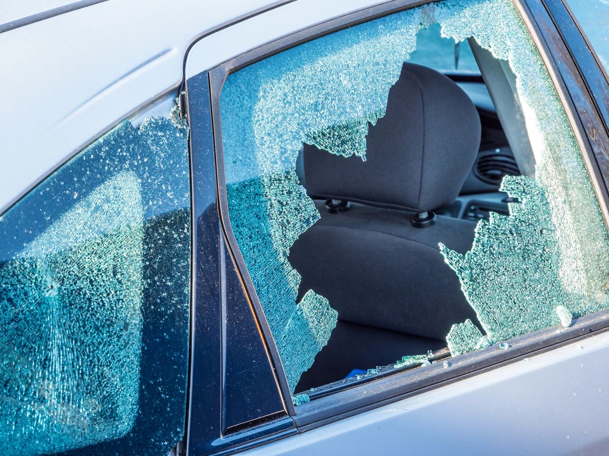 car with 2 broken windows