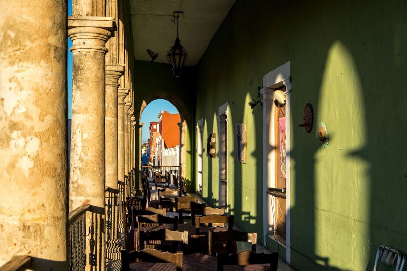 Historic colonial balcony bathed in beautiful late afternoon light in Campeche, Mexico