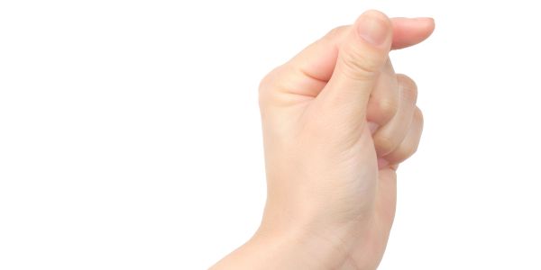 Hand making a snapping gesture against a white background.