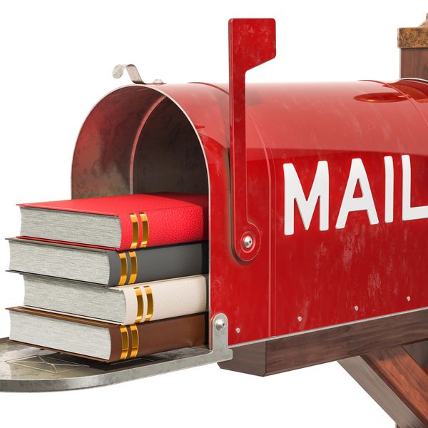 Red mailbox filled with colorful books instead of letters.