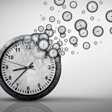 Clocks dissolving into smaller clocks, symbolizing time passing or fragmentation.