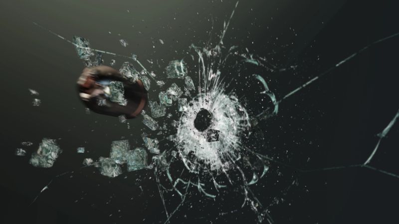 Bullet going through glass in slow motion