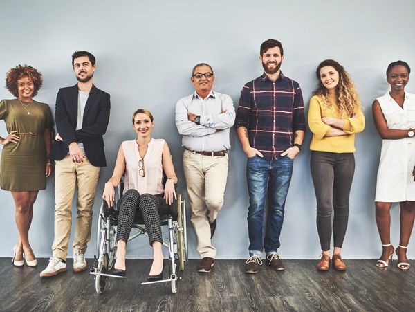 Group of people, including one in a wheelchair.