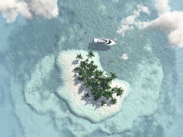 Small tropical island with palm trees and a boat.