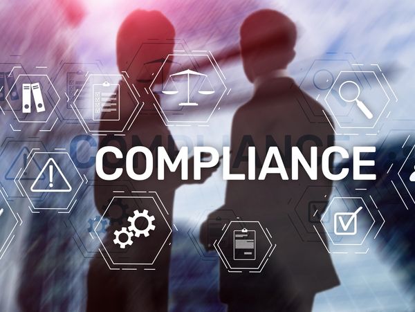 A stylized graphic or overlay of business people with the word 'COMPLIANCE' and related icons.