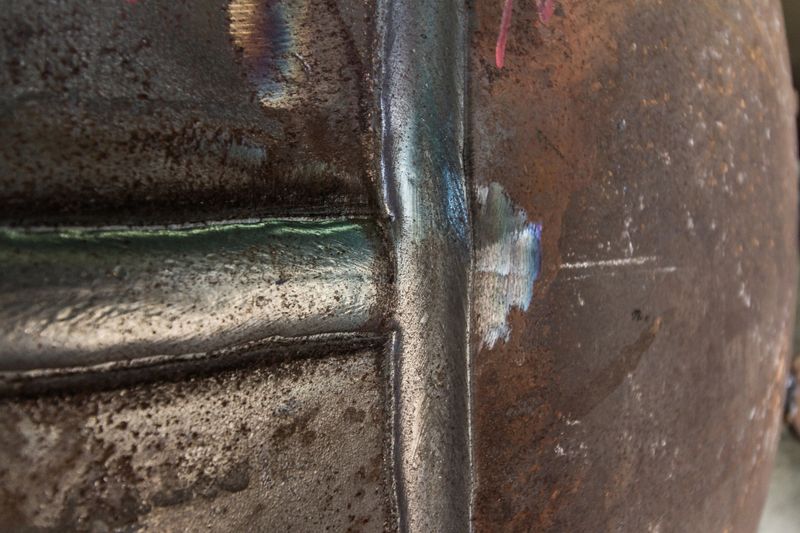 Butt weld T-joint of pressure vessel carbon steel background