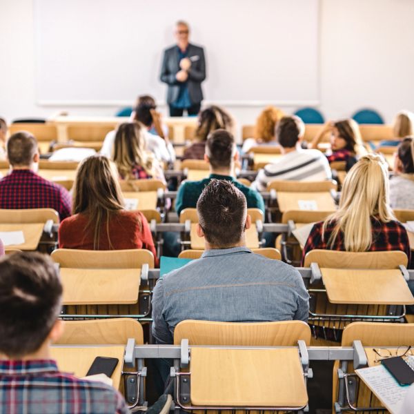 Students attending a lecture in a classroom.