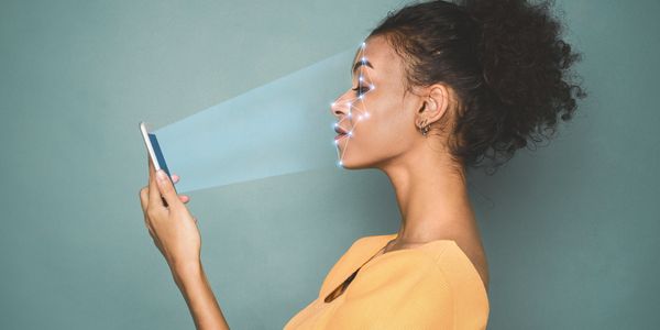 A person scanning their face with their phone