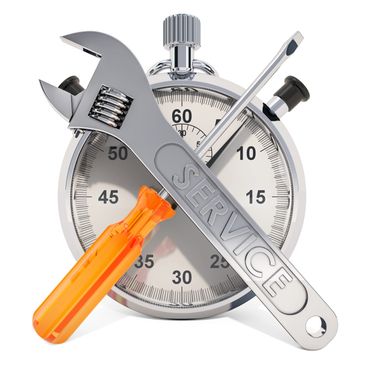 Stopwatch with wrench and screwdriver symbolizing fast service.