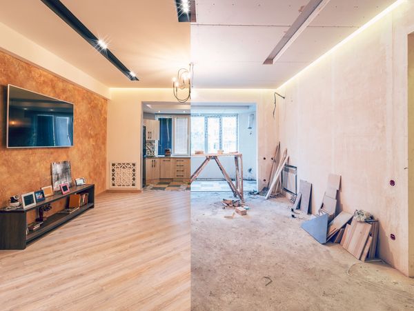 A room with two different floors and one is being remodeled.