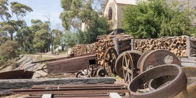 Old rusty industrial machinery outdoors.