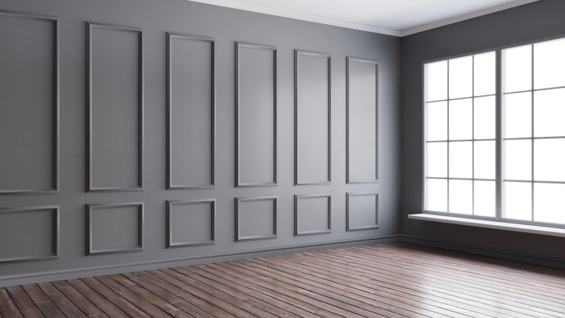 3d rendering illustration of big black room interior with big French windows and hardwood floor. Classical living room with molding, wall paneling. Day sun side light. Isolated on white backdrop, cut out.